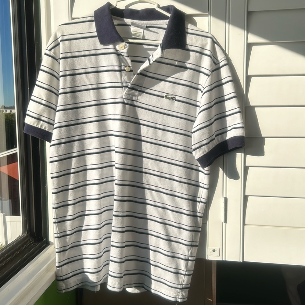 Lacoste white with blue pinstripes polo shirt. Men’s size 6.